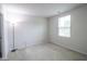 Bright bedroom features large window with natural light and a floor lamp for extra lighting at 975 Red Hills Ct, Lebanon, IN 46052