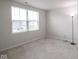 Bright bedroom with a large window that allows ample natural light to fill the space at 975 Red Hills Ct, Lebanon, IN 46052