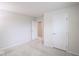Bright bedroom with a closet and white trim, plus neutral walls and carpet throughout at 975 Red Hills Ct, Lebanon, IN 46052