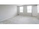 Spacious and bright bedroom with lots of natural light, neutral walls, and plush carpeting at 975 Red Hills Ct, Lebanon, IN 46052