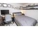 A bedroom includes decor, a bed, a desk and chair for work at 975 Red Hills Ct, Lebanon, IN 46052