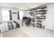 Bright bedroom with neutral colors and ample room for an office or study area at 975 Red Hills Ct, Lebanon, IN 46052