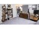 This cozy bedroom includes shelves and a desk for hobbies at 975 Red Hills Ct, Lebanon, IN 46052