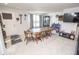 Cozy dining area featuring a large table and ample natural light at 975 Red Hills Ct, Lebanon, IN 46052