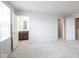Spacious main bedroom with neutral carpet and an en suite bathroom at 975 Red Hills Ct, Lebanon, IN 46052