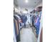 Walk-in closet with ample shelving and hanging space, perfect for all your storage needs at 975 Red Hills Ct, Lebanon, IN 46052