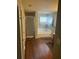 Bathroom featuring a soaking tub and separate shower behind clear glass at 1418 Osprey Way, Greenwood, IN 46143