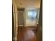 Bathroom featuring a soaking tub and separate shower behind clear glass at 1418 Osprey Way, Greenwood, IN 46143