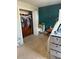 Bedroom with a large closet, ample lighting, and neutral-toned walls at 1418 Osprey Way, Greenwood, IN 46143