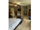 Spacious main bedroom with a canopy bed frame, walk-in closet, and adjoining bath at 1418 Osprey Way, Greenwood, IN 46143