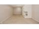 Spacious basement area with carpet and a white brick fireplace at 409 Dale St, Martinsville, IN 46151