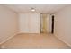 Finished basement with neutral carpet and closet storage at 409 Dale St, Martinsville, IN 46151