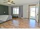 Bedroom with hardwood floors, a ceiling fan, and natural light at 409 Dale St, Martinsville, IN 46151