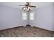 Bedroom featuring hardwood floors, ceiling fan, and natural light at 409 Dale St, Martinsville, IN 46151