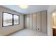 Bright bedroom with large window and accent wall at 4325 Hamilton Run, Zionsville, IN 46077