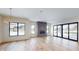 Bright dining room featuring hardwood floors and large windows with natural light at 4325 Hamilton Run, Zionsville, IN 46077
