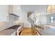 Modern kitchen features gas range, custom cabinetry, and sleek countertops at 4325 Hamilton Run, Zionsville, IN 46077