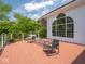 A spacious deck with seating provides an inviting space to enjoy the outdoors at 5784 N 600 E, Greenfield, IN 46140