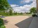 A spacious driveway with a basketball hoop leads to a barn and offers ample parking and recreational space at 5784 N 600 E, Greenfield, IN 46140