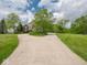 Long driveway leading to a beautiful home with well-maintained landscaping at 5784 N 600 E, Greenfield, IN 46140