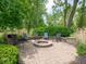 Cozy outdoor firepit area with stone seating perfect for entertaining at 5784 N 600 E, Greenfield, IN 46140