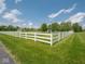 Expansive fenced yard with lush green grass, perfect for outdoor activities and recreation at 5784 N 600 E, Greenfield, IN 46140