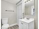 Clean bathroom with white vanity and fixtures at 606 N Colorado Ave, Indianapolis, IN 46201