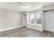 Spacious bedroom with hardwood floors and ample closet space at 606 N Colorado Ave, Indianapolis, IN 46201