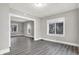 Bright living room featuring hardwood floors and an open floorplan at 606 N Colorado Ave, Indianapolis, IN 46201