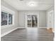Living room with sliding glass doors leading to a deck at 606 N Colorado Ave, Indianapolis, IN 46201