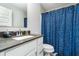 Stylish bathroom featuring a shower with sliding glass doors and vanity sink at 7282 Zanesville Rd, Carmel, IN 46033
