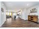 Open concept living space with hardwood floors, modern decor, and seamless flow at 7282 Zanesville Rd, Carmel, IN 46033