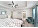 Relaxing main bedroom with tray ceiling, and ensuite bathroom with glass enclosed shower at 7282 Zanesville Rd, Carmel, IN 46033