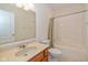 Bathroom features a single sink vanity, large mirror, and shower at 7290 Lockford Walk N, Avon, IN 46123