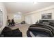 Spacious bedroom with neutral carpet, cozy chair and comfortable furniture at 7290 Lockford Walk N, Avon, IN 46123