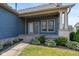 Charming front porch with inviting walkway and well-manicured landscaping at 7290 Lockford Walk N, Avon, IN 46123