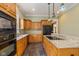 Well-equipped kitchen with granite countertops, stainless steel appliances, and ample storage at 7290 Lockford Walk N, Avon, IN 46123