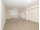 Spacious living room with plush carpeting and natural light at 7290 Lockford Walk N, Avon, IN 46123