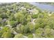 Overhead view of the community near a tranquil lake, with lush trees and green lawns at 1127 Grant Cir, Cicero, IN 46034
