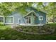 Home's backyard shows the back exterior with deck and lawn area, perfect for outdoor enjoyment at 1127 Grant Cir, Cicero, IN 46034