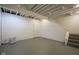 Spacious unfinished basement ready for your customization, featuring clean walls and painted ceiling with visible beams at 1127 Grant Cir, Cicero, IN 46034
