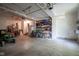 Spacious garage with shelves and storage options, providing plenty of room for vehicles and other equipment at 1127 Grant Cir, Cicero, IN 46034