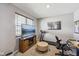 Bedroom with a window, television, treadmill, and office area at 8131 Trailstay Dr, Camby, IN 46113