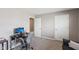 Bedroom featuring a comfortable grey chair and desk at 8131 Trailstay Dr, Camby, IN 46113