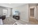 Cozy bonus room with plush carpet, comfortable seating, and entertainment center at 8131 Trailstay Dr, Camby, IN 46113