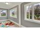 Bright sunroom with large windows offering plenty of natural light at 8240 Shelbyville Rd, Indianapolis, IN 46259