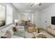 Bright living room features hardwood floors and an open floor plan at 907 S East St, Indianapolis, IN 46225