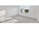 Bright, carpeted bedroom with large double window at 908 Stonehaven Dr, Indianapolis, IN 46239
