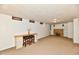 Finished basement features built-in shelving, a fireplace, and extra seating space at 7912 E St Joseph St, Indianapolis, IN 46219