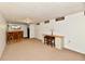 Finished basement features a bar, seating area, and a desk area at 7912 E St Joseph St, Indianapolis, IN 46219